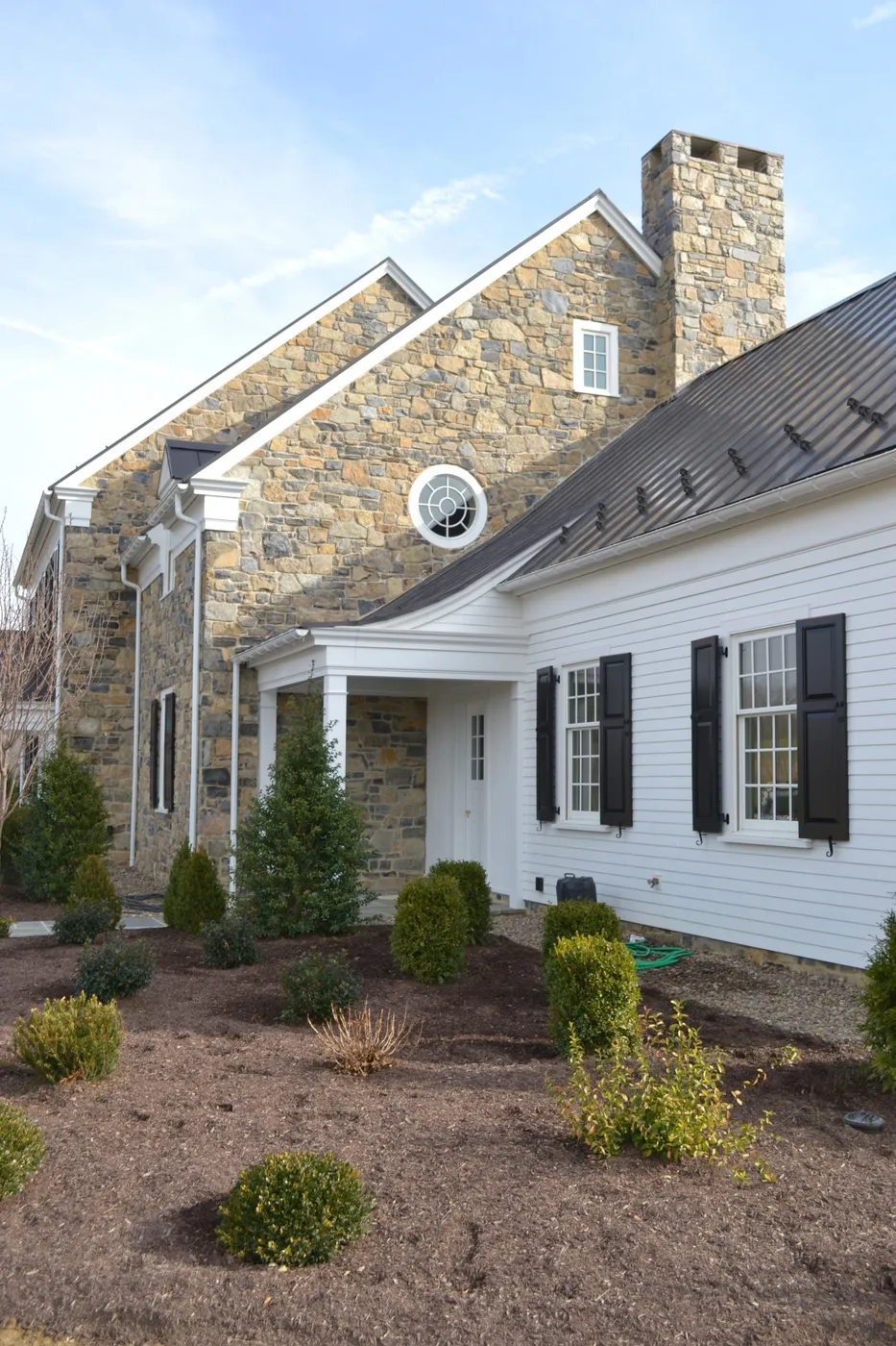 The Baylor House in Lewisburg, PA — a custom home faced in natural mountain stone by Pyle Bros.