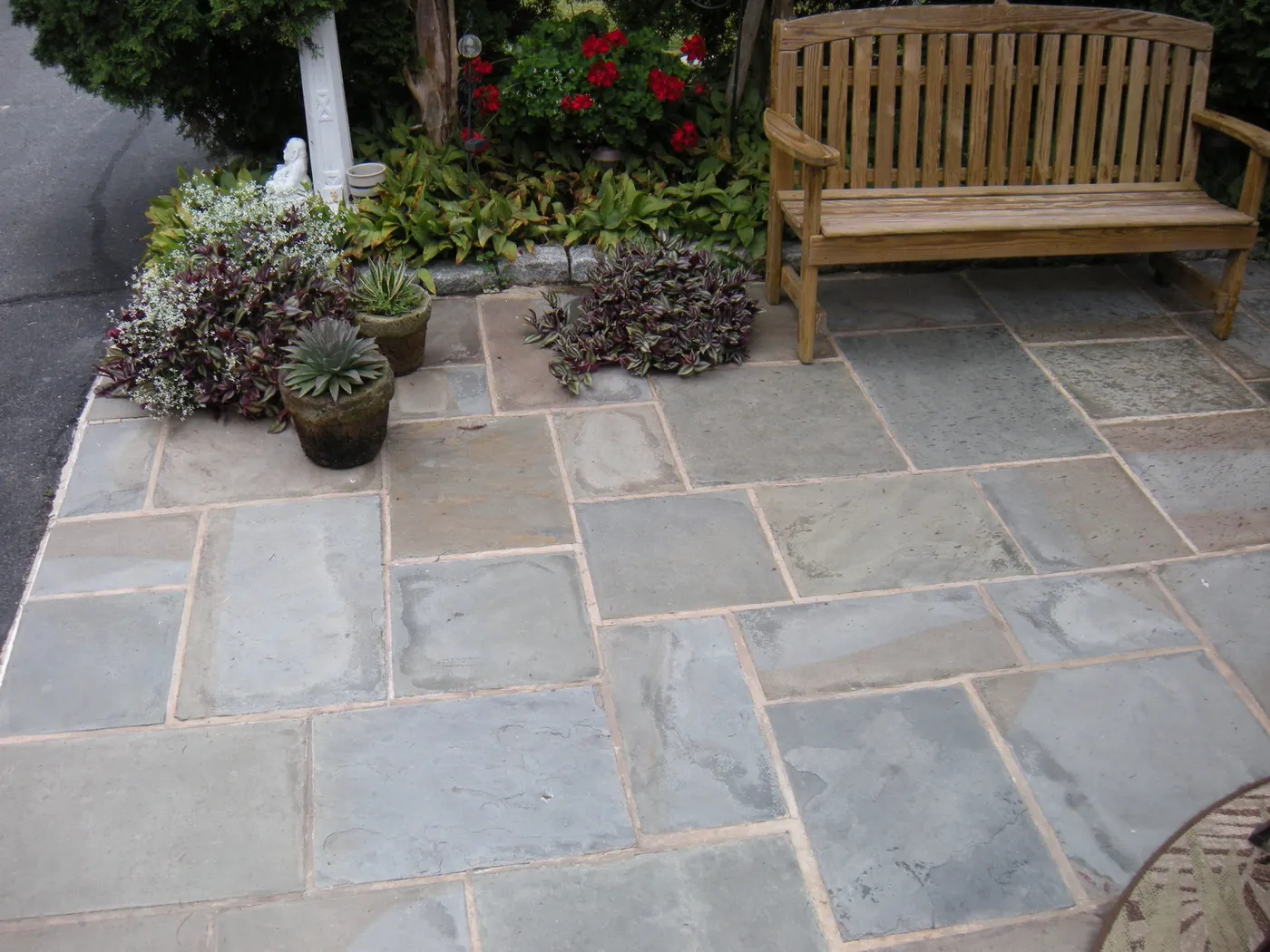 A flagstone patio at the Pyle Residence in Mt. Pleasant Mills, PA, by Pyle Bros.