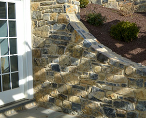 Combine Beauty and Utility with a stone retaining wall by Pyle Bros Building Stone Contractors